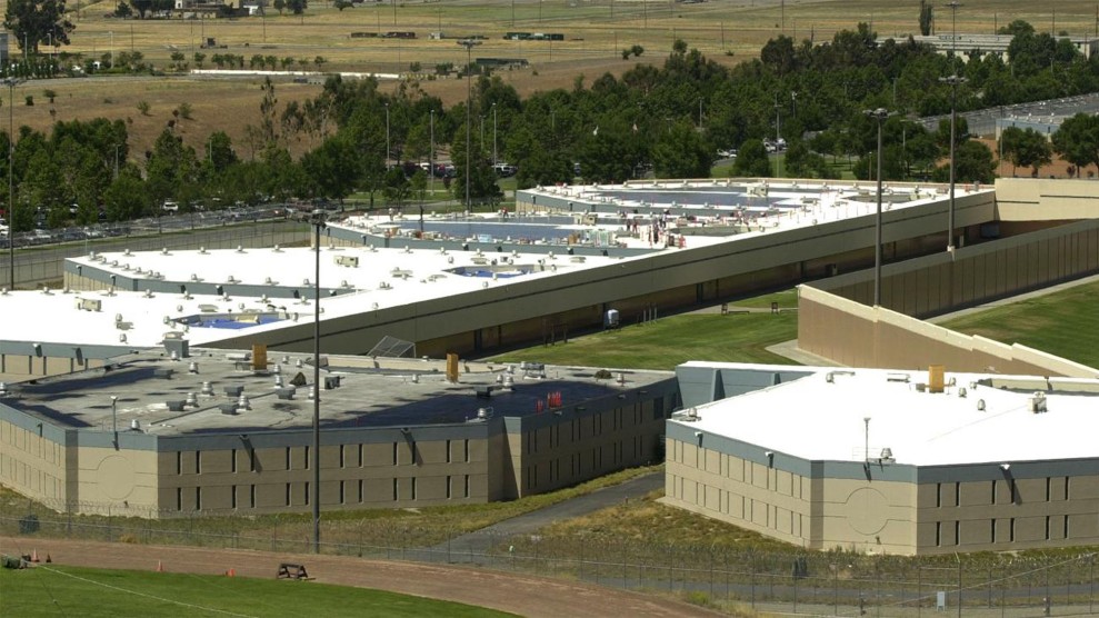 Daytime, sun out. A slanted, aerial view of the east housing units of Santa Rita Jail in Alameda County, CA